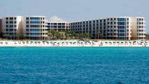 A hotel with multiple floors, a beachside location, and a pool area. - Waterscape 3rd Flr  1 Bedroom with Courtyard views - on the beach - (Ft Walton Beach)