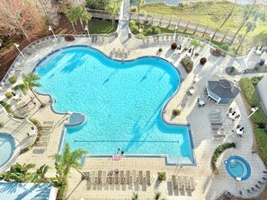 A heated pool - Lakefront Condo · Disney Fireworks, Sunrise Views · Heated Pools · 2 Full Baths (Orlando)