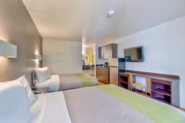 Desk, laptop workspace, free WiFi, bed sheets