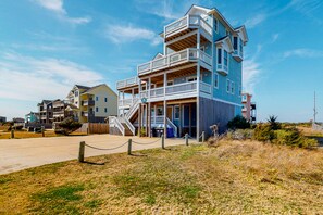 Stunning multi-story building with balconies and a charming entrance.