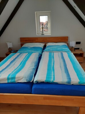 2 dormitorios, tabla de planchar con plancha, cuna de viaje y wifi