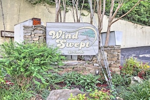 Surrounded by lush greenery, this property offers a serene escape.