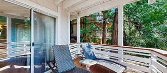 Dog-friendly home with lake access - fireplace, decks, fire table & gas grill