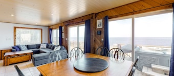 Waterfront, dog-friendly house with pool, W/D, private hot tub, & AC