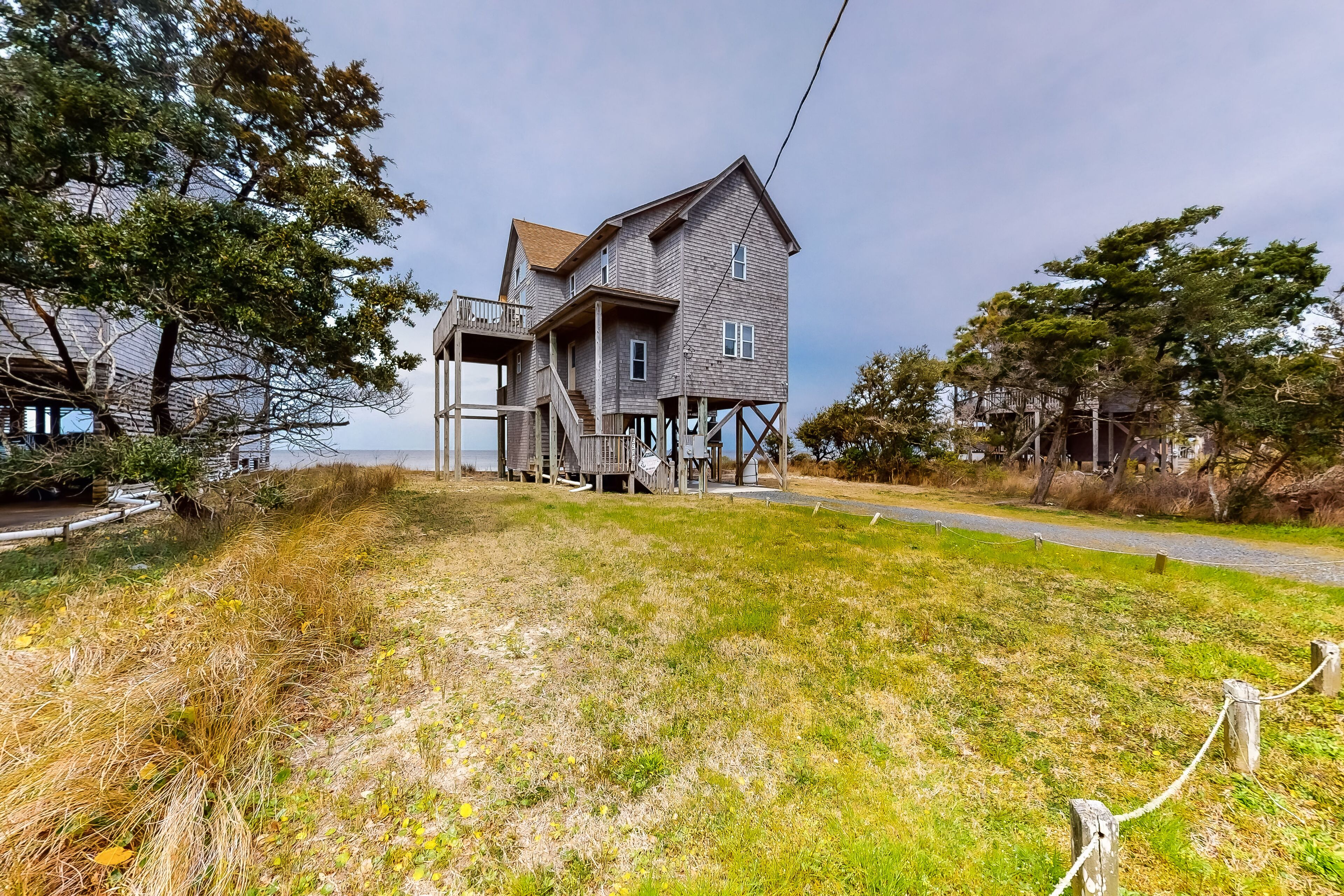 Waterfront, dog-friendly house with sound views, shared pool, & private hot tub