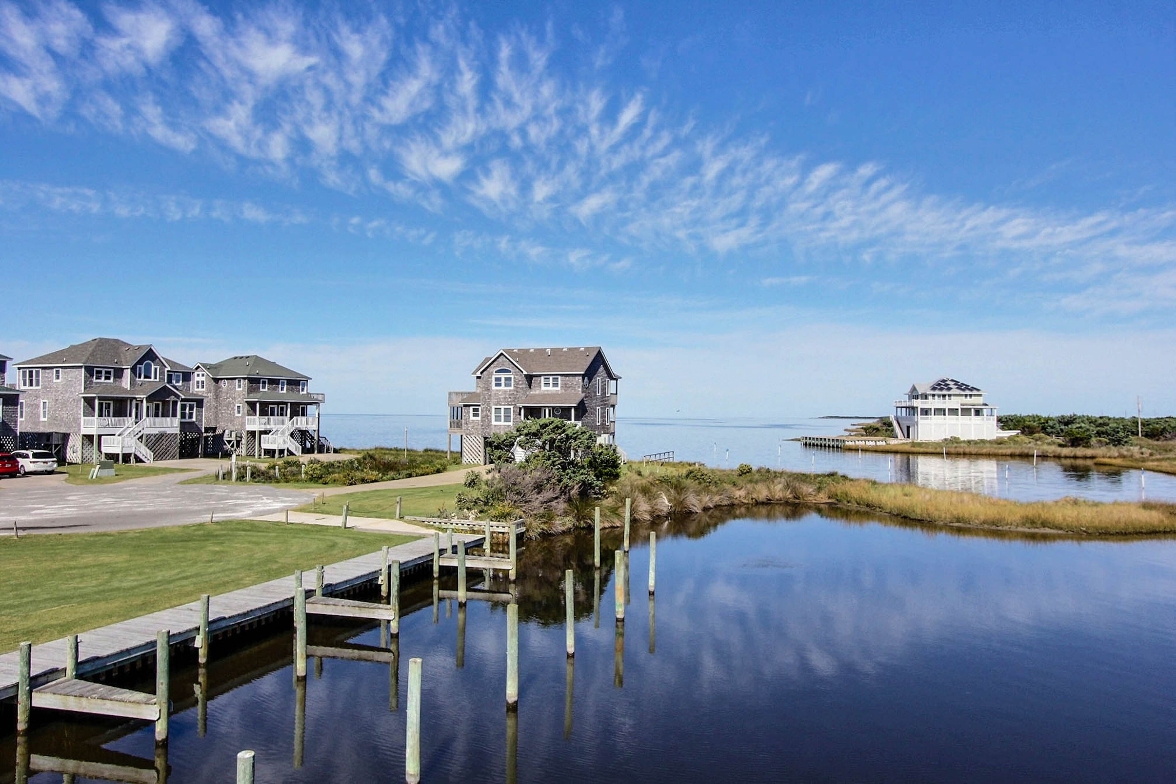 Waterfront home with private hot tub, W/D, pool - two dogs welcome