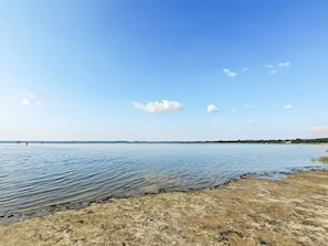A wide, calm body of water with a clear sky and a distant shoreline. - Holiday Home in JÃ¦gerspris (Jægerspris)