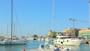 A marina with various boats docked, including sailboats and motorboats. - Holiday Home Near Urbino & Beaches (Tavullia)