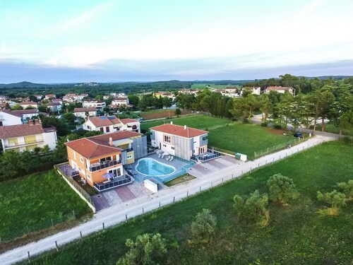 Ground Floor Apartment With Terrace and Shared Pool, Near the Beach