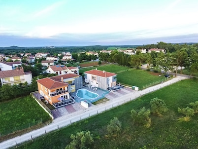 Ground Floor Apartment With Terrace and Shared Pool, Near the Beach