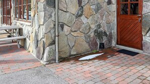 A stone building with a wooden door and windows. - 3 Person Holiday Home in BOE Telemark (Midt-Telemark)