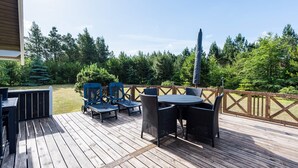 Outdoor dining - 4 Person Holiday Home in Norre Nebel (Norre Nebel)