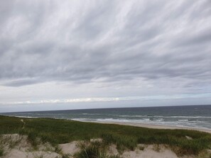 A beach with sand dunes and a cloudy sky. - 4 Star Holiday Home in Hvide Sande (Hvide Sande)