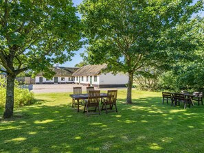 Outdoor dining - 4 Person Holiday Home in Norre Nebel (Norre Nebel)