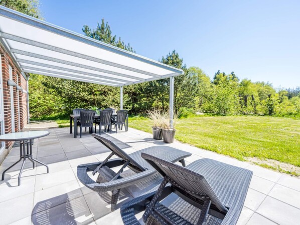 Outdoor dining - 8 Person Holiday Home in Norre Nebel (Norre Nebel)