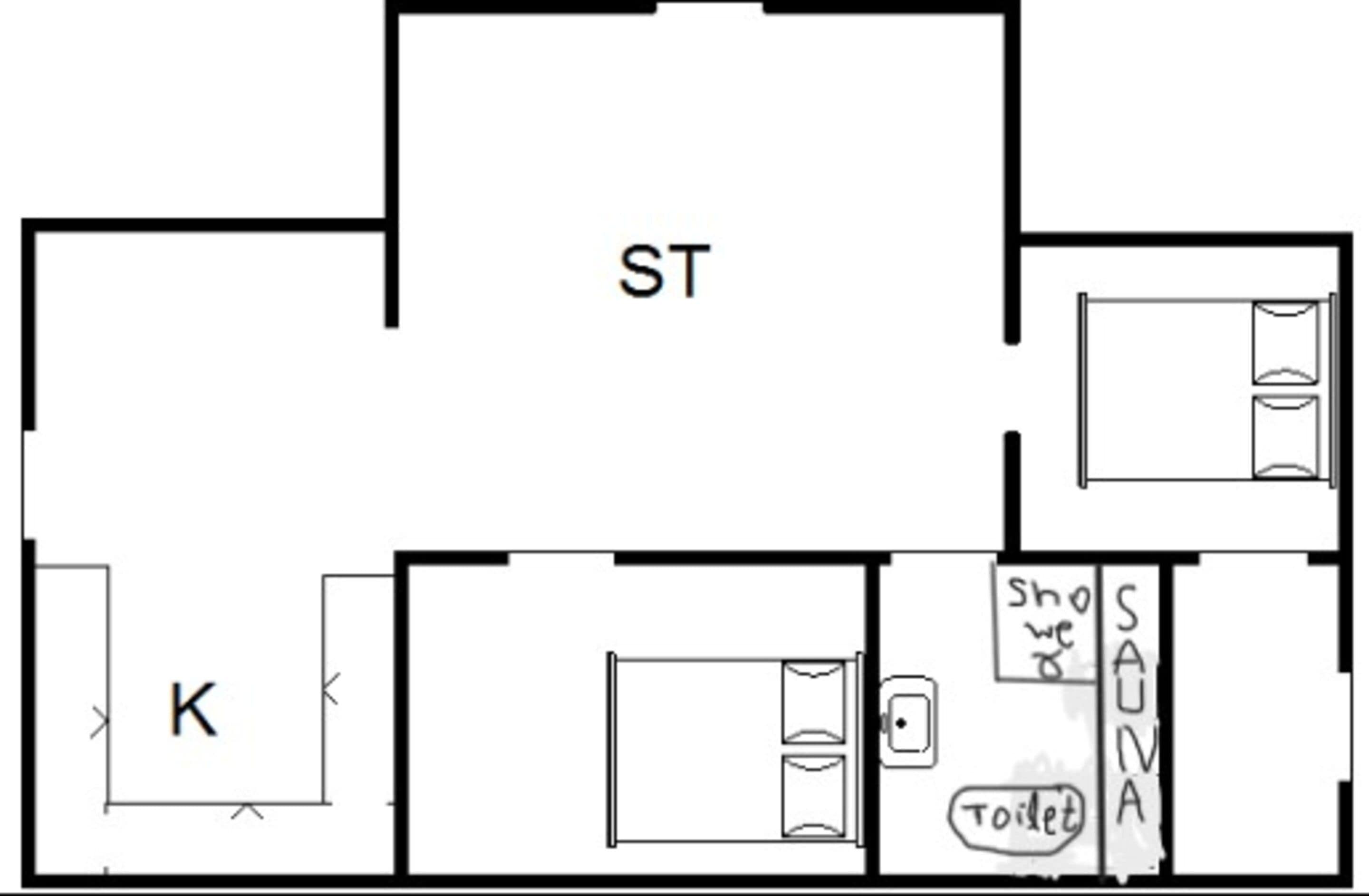 A floor plan with labeled rooms: ST, K, and a bathroom with a shower and toilet.