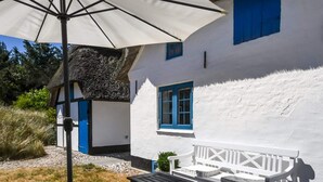 Outdoor dining - 4 Person Holiday Home in Norre Nebel (Norre Nebel)
