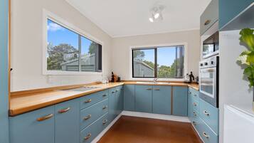 Fridge, microwave, toaster, cookware/dishes/utensils