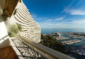 Enjoy panoramic views of the marina and sea from this hotel's balcony.