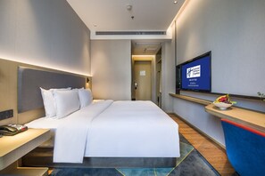 Down duvets, pillow-top beds, minibar, in-room safe
