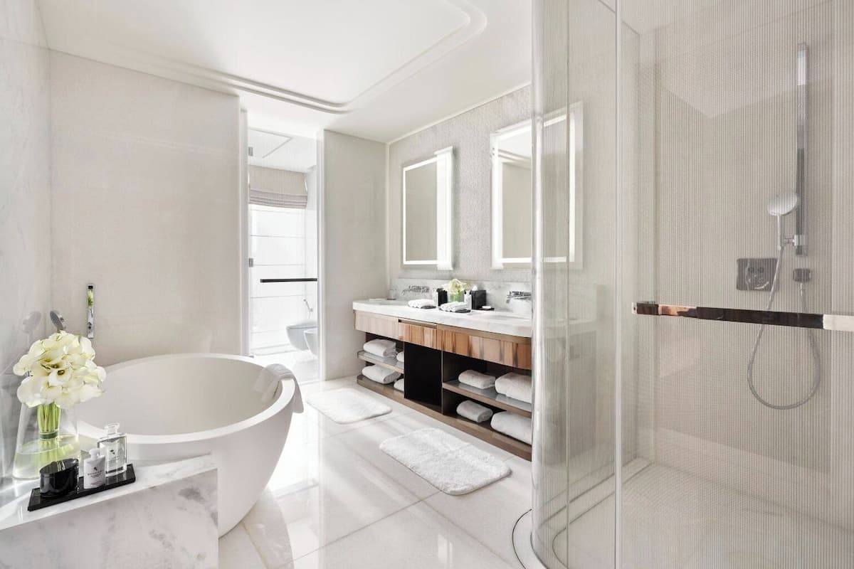 hair dryer, bathrobes, slippers, towels