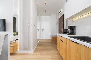 Apartment, 1 Bedroom, Balcony | Private kitchenette | Microwave, dishwasher, coffee/tea maker, cookware/dishes/utensils