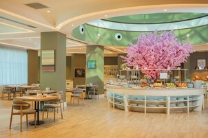 Daily buffet breakfast (USD 15 per person)