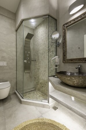 Shower, hair dryer, towels, soap