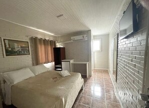 Standaard vierpersoonskamer | Een minibar, gratis wifi