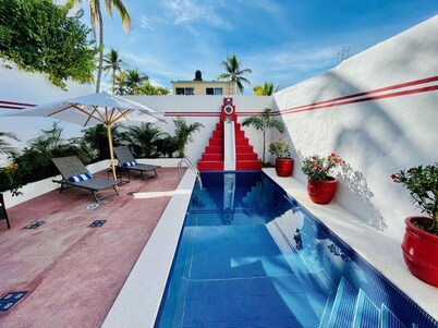 2 bed, 2 bath house w/ private pool, pyramid waterfall, short walk to beach.