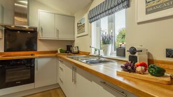 Microwave, dishwasher, coffee/tea maker, highchair