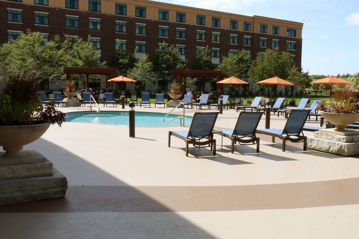 indoor pool, seasonal outdoor pool, pool umbrellas, pool loungers