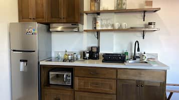 Fridge, microwave, coffee/tea maker, toaster
