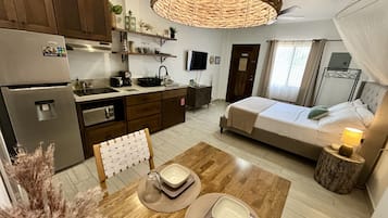 1 bedroom, desk, iron/ironing board, travel cot