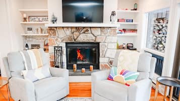 TV connectée, cheminée, jeux vidéo, chaîne hi-fi