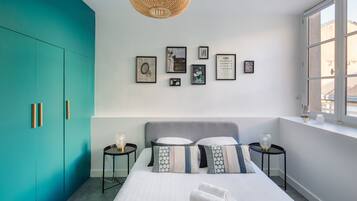 1 slaapkamer, een strijkplank/strijkijzer, gratis wifi, beddengoed