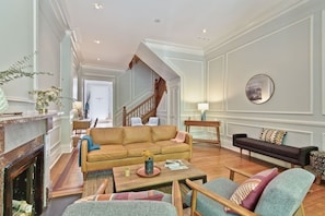 TV, fireplace, books, offices