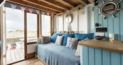 Stargaze from a beach hut on the Mudeford Sandbank