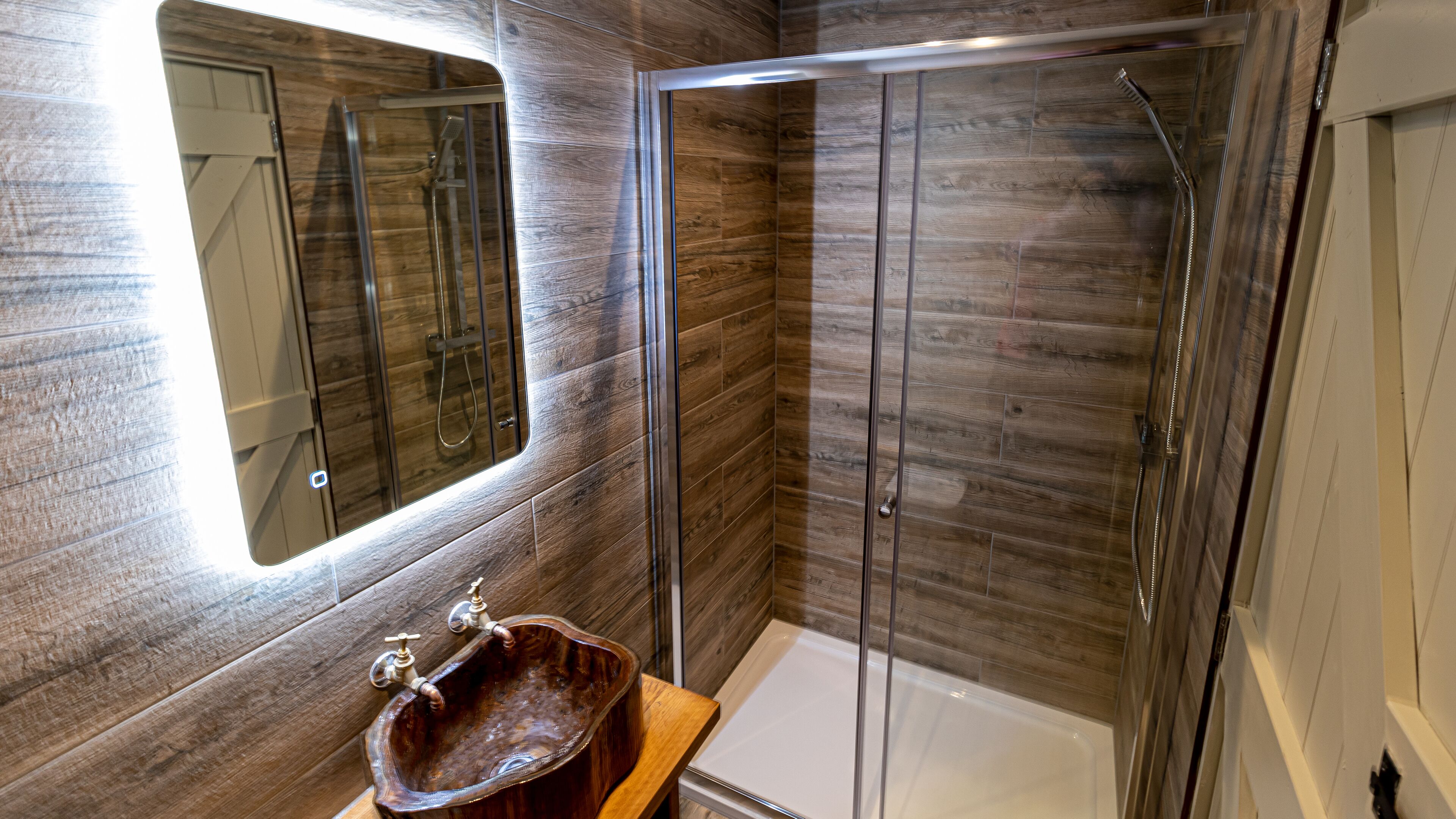 the tree house | bathroom | designer toiletries, hair dryer, towels, soap