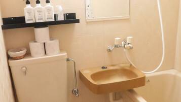 Hair dryer, towels, soap, shampoo