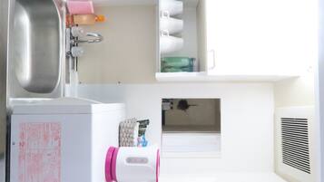 Hair dryer, towels, soap, shampoo
