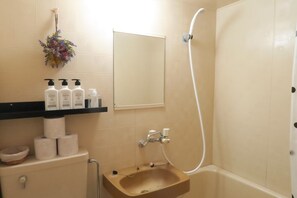 Hair dryer, towels, soap, shampoo