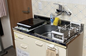 Fridge, microwave, stovetop, cookware/dishes/utensils