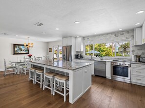 Fridge, microwave, oven, stovetop - Ultimate Beach House | Waterfront + Heated Pool (St. Pete Beach)