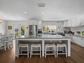 Fridge, microwave, oven, stovetop - Ultimate Beach House | Waterfront + Heated Pool (St. Pete Beach)
