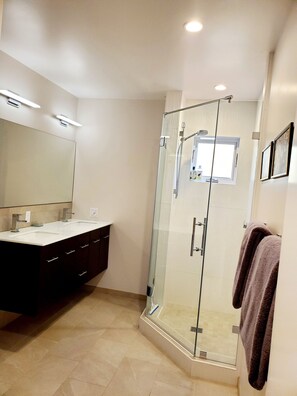 Bathtub, hair dryer, towels, soap