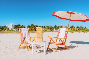 Beach nearby, white sand, sun-loungers, beach towels