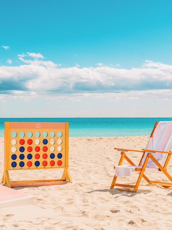 Beach nearby, white sand, sun loungers, beach towels