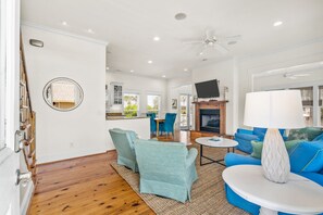 Smart TV, fireplace, books, stereo