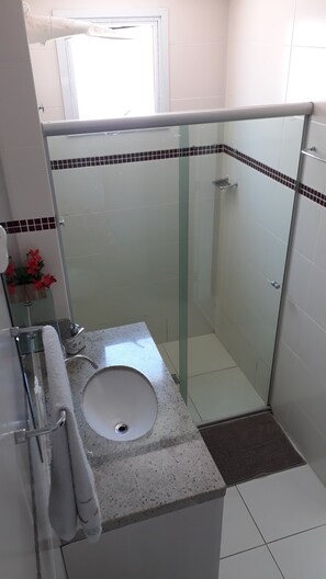 Shower, towels, soap, toilet paper